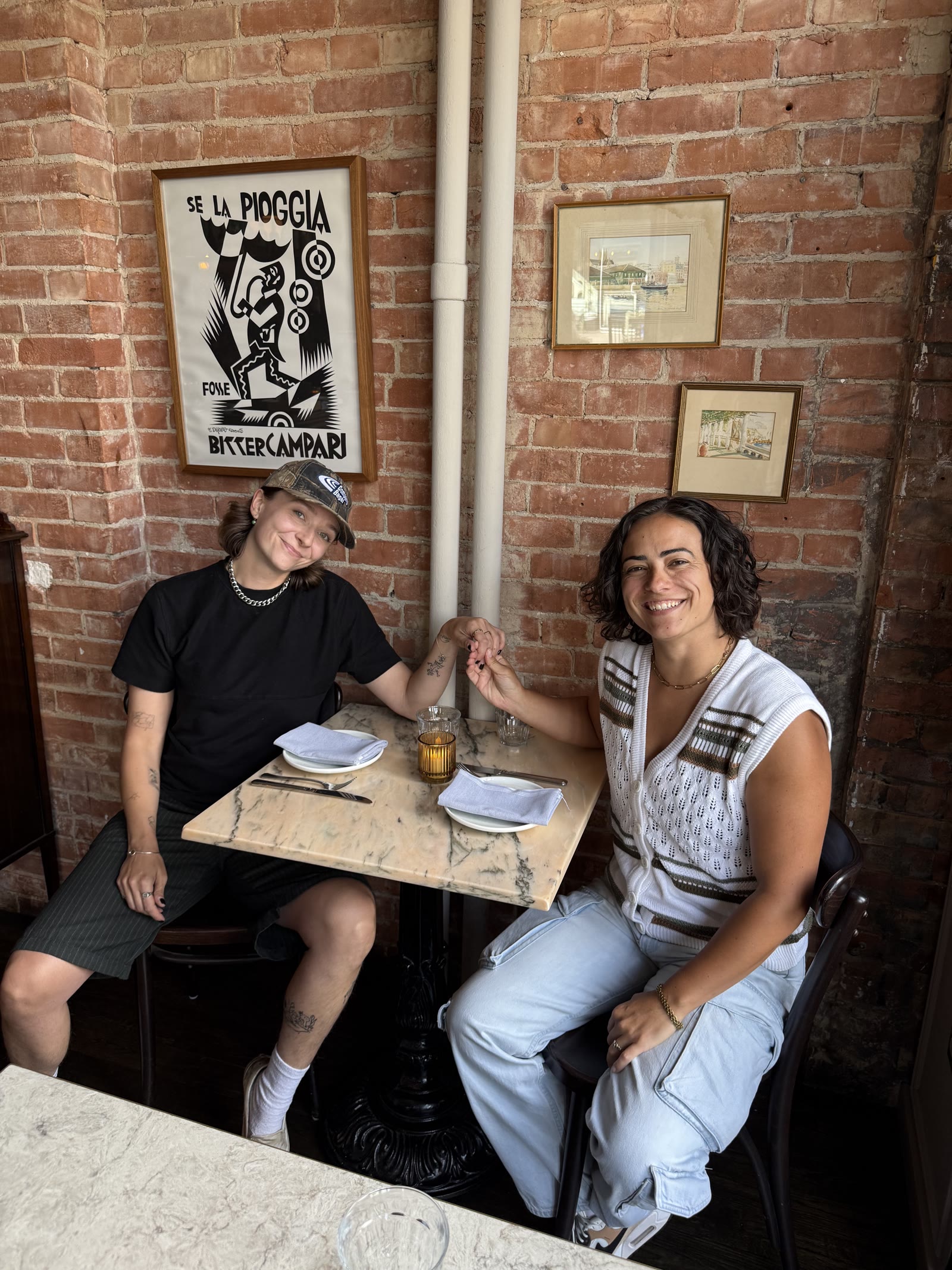 Chef Maddy Goldberg and Sommelier Sarah Mifsud sharing a table